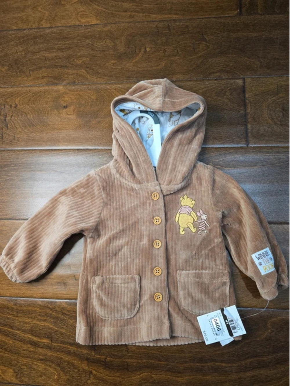 0 to 3m brand new disney winnie, the pooh jacket. Item 406G5
